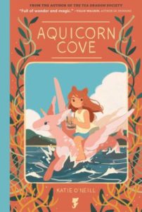 The cover of Katie O'Neill's Aquicorn Cove, with a young girl riding on the back of a sea pegasus